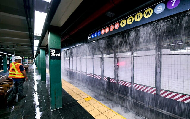 This photo, provided by MTA New York City Transit, shows water from a water main break cascading into New York's Times Square subway station, Tuesday, August 29, 2023. (Marc A. Hermann/MTA, via AP) This photo, provided by MTA New York City Transit, shows water from a water main break cascading into New York's Times Square subway station, Tuesday, August 29, 2023. (Marc A. Hermann/MTA, via AP)
