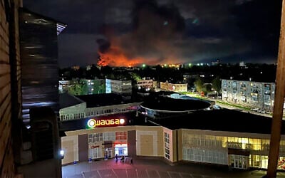 A large blaze breaks out after a Ukrainian drone strike in Pskov, Russia, on August 29, 2023. (Ostorozhno Novosti via AP)
