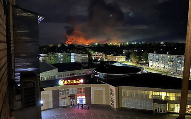 A large blaze breaks out after a Ukrainian drone strike in Pskov, Russia, on August 29, 2023. (Ostorozhno Novosti via AP) A large blaze breaks out after a Ukrainian drone strike in Pskov, Russia, on August 29, 2023. (Ostorozhno Novosti via AP)