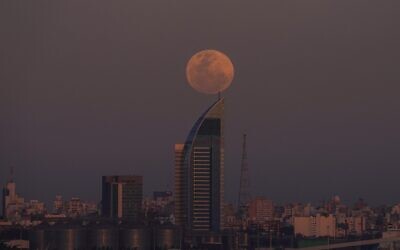 A supermoon rises over Montevideo, Uruguay, August 30, 2023. (Matilde Campodonico/AP)