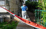 Illustrative. Police at the scene where a woman was found dead in her apartment in Haifa, March 17, 2023. (Flash90)