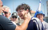 Amitai Aboudi outside the police station in Jaffa, August 1, 2023, after his release from a third round of questioning. (Miriam Alster/Flash90)