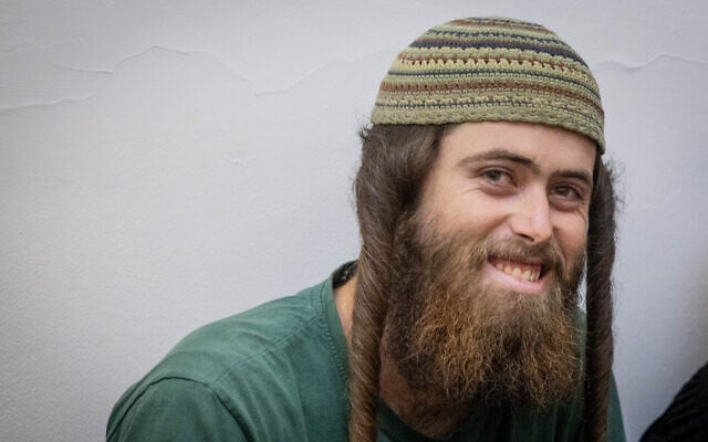 Elisha Yered, suspected of being involved in the death of 19-year-old Palestinian Qusai Jamal Maatan in the West Bank village of Burqa, arrives for a hearing at the District Court in Jerusalem, August 8, 2023. (Chaim Goldberg/Flash90) Elisha Yered, suspected of being involved in the death of 19-year-old Palestinian Qusai Jamal Maatan in the West Bank village of Burqa, arrives for a hearing at the District Court in Jerusalem, August 8, 2023. (Chaim Goldberg/Flash90)