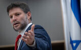 Finance Minister Bezalel Smotrich speaks at a press conference in Jerusalem on August 9, 2023. (Chaim Goldberg/Flash90)