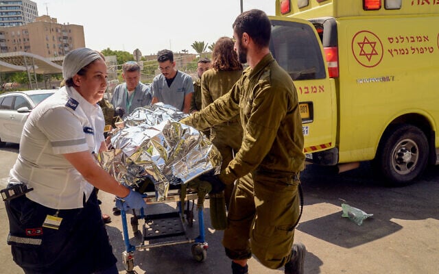 A wounded man from a shooting attack on Route 60, near Hebron, arrives at Soroka Medical center in Beersheba, southern Israel, August 21, 2023. (Flash90)