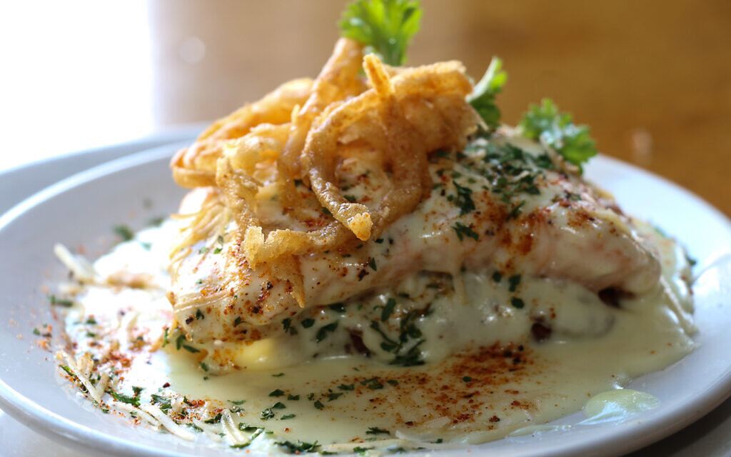 Hyman's Seafood Salmon and Grits, as featured in 'Kugels and Collards.' (Forest Clonts)