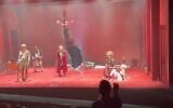 A heckler interrupts the performance of Exit the King at the Cameri Theatre in Tel Aviv on August 11, 2023. (Screen capture/Twitter)