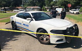 Memphis police officers at the scene of an officer-involved shooting, July 31, 2023, in Memphis, Tennessee. (AP Photo/Adrian Sainz)