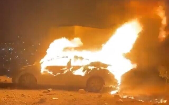 A car belonging to an Israeli who mistakenly entered the Palestinian West Bank town of Turmus Ayya goes up in flames on August 20, 2023. (Screenshot: Twitter; used in accordance with Clause 27a of the Copyright Law) A car belonging to an Israeli who mistakenly entered the Palestinian West Bank town of Turmus Ayya goes up in flames on August 20, 2023. (Screenshot: Twitter; used in accordance with Clause 27a of the Copyright Law)