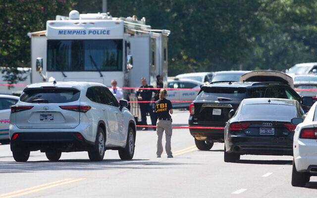 Tennessee Bureau of Investigation agents and Memphis Police Department officers, after a man suspected of a shooting at a synagogue was shot, in Memphis, Tennessee, July 31, 2023. (Chris Day/The Commercial Appeal via AP, File) Tennessee Bureau of Investigation agents and Memphis Police Department officers, after a man suspected of a shooting at a synagogue was shot, in Memphis, Tennessee, July 31, 2023. (Chris Day/The Commercial Appeal via AP, File)