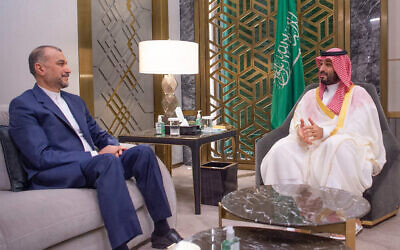 This handout picture provided by the Saudi foreign ministry shows Iran's Foreign Minister Hossein Amir-Abdollahian, left, meeting with Saudi Arabia's Crown Prince Mohammad Bin Salman, in Jeddah on August 18, 2023. (Saudi Foreign Ministry/AFP)