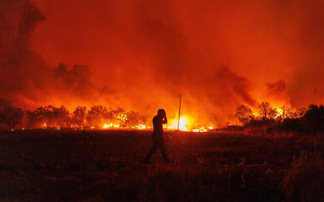 A wildfire in Avantas, near Alexandroupolis, in the northeastern Evros region of Greece, August 21, 2023. (AP Photo/Achilleas Chiras) A wildfire in Avantas, near Alexandroupolis, in the northeastern Evros region of Greece, August 21, 2023. (AP Photo/Achilleas Chiras)