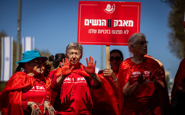 Women's rights activists protest outside a cabinet meeting at the Prime Minister's Office in Jerusalem on April 2, 2023. (Yonatan Sindel/ Flash90/ File) Women's rights activists protest outside a cabinet meeting at the Prime Minister's Office in Jerusalem on April 2, 2023. (Yonatan Sindel/ Flash90/ File)