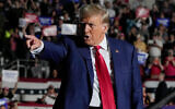 Republican presidential candidate and former US president Donald Trump arrives for a campaign rally in Erie, Pennsylvania, July 29, 2023. (AP Photo/Sue Ogrocki, File)