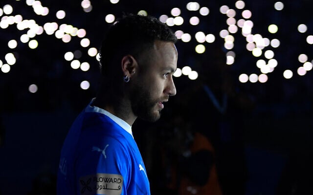 Brazilian superstar Neymar walks onto the field during his unveiling ceremony at Riyadh's King Fahd International Stadium on August 19, 2023. (Photo by AFP) Brazilian superstar Neymar walks onto the field during his unveiling ceremony at Riyadh's King Fahd International Stadium on August 19, 2023. (Photo by AFP)