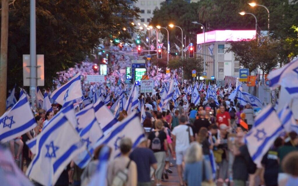 Anti-overhaul protesters march on Tel Aviv's Kaplan Street, August 5, 2023. (Michel Braunstein) Anti-overhaul protesters march on Tel Aviv's Kaplan Street, August 5, 2023. (Michel Braunstein)