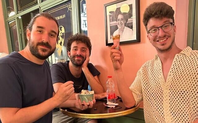 AJR band members eating Anita ice cream in Tel Aviv's Neve Tzedek neighborhood ahead of their August 29, 2023 warmup show for Imagine Dragons in Yarkon Park (Courtesy PR) AJR band members eating Anita ice cream in Tel Aviv's Neve Tzedek neighborhood ahead of their August 29, 2023 warmup show for Imagine Dragons in Yarkon Park (Courtesy PR)