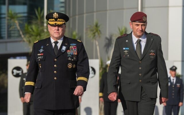 IDF Chief of Staff Lt. Gen. Herzi Halevi (L) greets US Joint Chiefs of Staff chairman, Gen. Mark Milley at the Kirya military headquarters in Tel Aviv on August 22, 2023. (Israel Defense Forces)