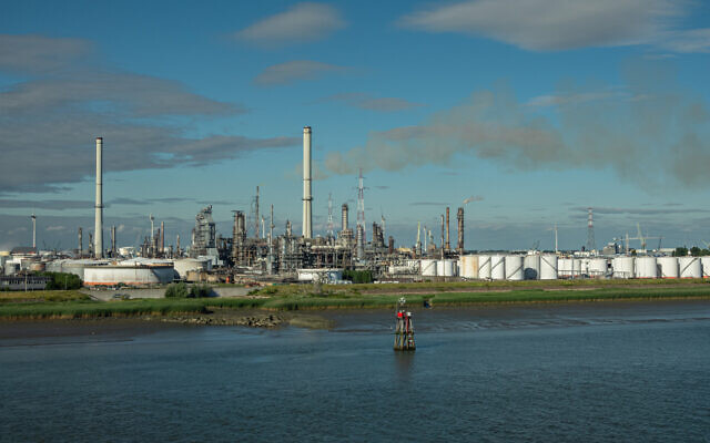ExxonMobil petroleum refinery and storage tanks, Antwerp, Belgium, July 10, 2022. (ClaudineVM, iStock/Getty Images) ExxonMobil petroleum refinery and storage tanks, Antwerp, Belgium, July 10, 2022. (ClaudineVM, iStock/Getty Images)