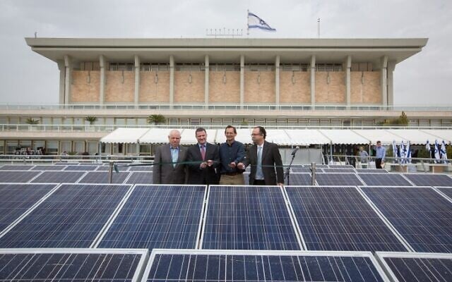 The Knesset cut a ribbon for new solar panels on March 29, 2015. But the Jerusalem Municipality gets poor marks for solar provision on existing facilities according to an index of local authorities launched on August 8, 2023. (Miriam Alster/FLASH90) The Knesset cut a ribbon for new solar panels on March 29, 2015. But the Jerusalem Municipality gets poor marks for solar provision on existing facilities according to an index of local authorities launched on August 8, 2023. (Miriam Alster/FLASH90)