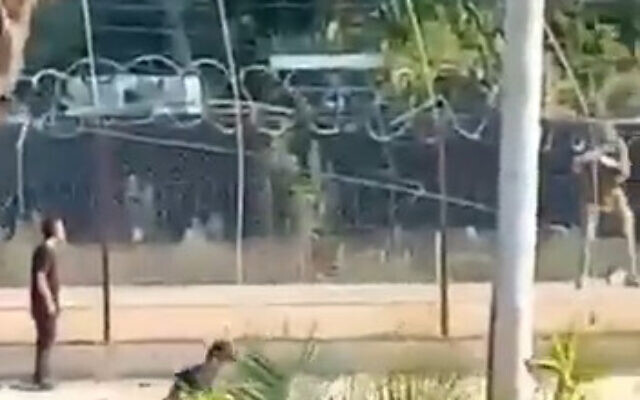 An Israeli soldier is seen shooting a seemingly unarmed Palestinian man close to the West Bank security barrier, near Qalqiliya, August 18, 2023. (Screenshot: X) An Israeli soldier is seen shooting a seemingly unarmed Palestinian man close to the West Bank security barrier, near Qalqiliya, August 18, 2023. (Screenshot: X)