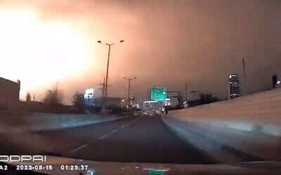 A screenshot from a video of a large blast seen from a driving dashboard in Ramat Hasharon in the early hours of Tuesday, August 15, 2023. (Daniel Amram on Telegram, used in accordance with Clause 27a of the Copyright Law)
