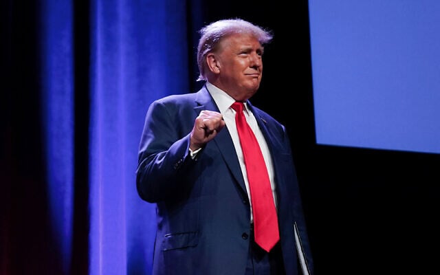 Former US president Donald Trump gestures before speaking at the Republican Party of Iowa's 2023 Lincoln Dinner in Des Moines, Iowa, July 28, 2023. (AP/Charlie Neibergall) Former US president Donald Trump gestures before speaking at the Republican Party of Iowa's 2023 Lincoln Dinner in Des Moines, Iowa, July 28, 2023. (AP/Charlie Neibergall)