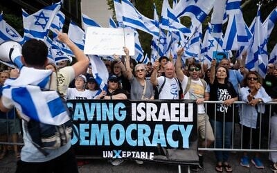 Protesters rally outside the United Nations while Defense Minister Yoav Gallant holds a meeting inside, in New York City, August 28, 2023. (Luke Tress/Times of Israel)