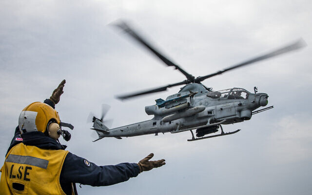 Illustrative: A AH-1Z Viper attack helicopter departs from the flight deck of the Wasp-class amphibious assault ship USS Kearsarge (LHD 3) on June 7, 2022, during military exercises in the Baltic Sea. (Jonathan Nackstrand/AFP)