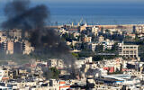 Smoke billows during clashes in the Ain el-Helweh camp for Palestinian refugees, in Lebanon's southern coastal city of Sidon on September 8, 2023. (Mahmoud ZAYYAT / AFP)