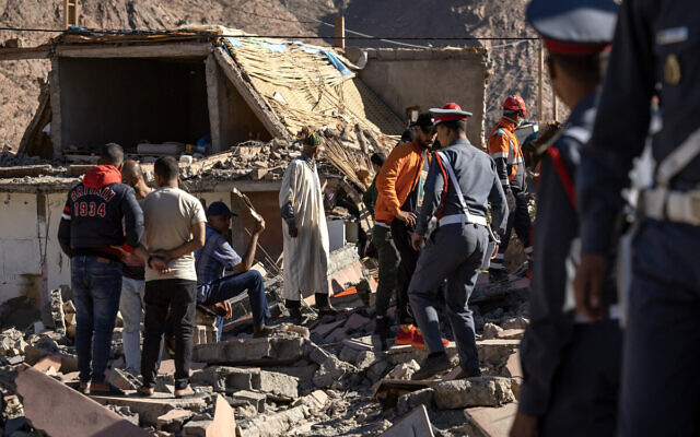 Volunteers search for survivors in the rubble in the village of Talat N'Yacoub, south of Marrakech on September 11, 2023. (FADEL SENNA / AFP)