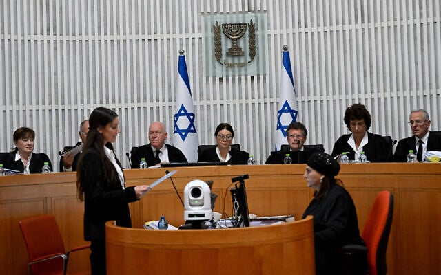 President of the Supreme Court Esther Hayut and all fifteen judges assemble to hear petitions against the 'reasonableness clause' at the court premises in Jerusalem, on September 12, 2023. (DEBBIE HILL / POOL / AFP)