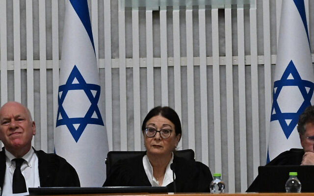 President of the Supreme Court Esther Hayut and all fifteen judges assemble to hear petitions against the 'reasonableness clause' at the court premises in Jerusalem, on September 12, 2023. (Photo by DEBBIE HILL / POOL / AFP) President of the Supreme Court Esther Hayut and all fifteen judges assemble to hear petitions against the 'reasonableness clause' at the court premises in Jerusalem, on September 12, 2023. (Photo by DEBBIE HILL / POOL / AFP)