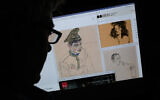 This photo illustration created in Los Angeles, California, on September 13, 2023, shows a person looking on a computer screen at artwork by Austrian Expressionist Egon Schiele entitled 'Russian War Prisoner' (L), 'Portrait of a Man' (R) and 'Girl With Black Hair' (top), which were seized by investigators after the Manhattan district attorney's office issued warrants. (Chris Delmas/AFP)