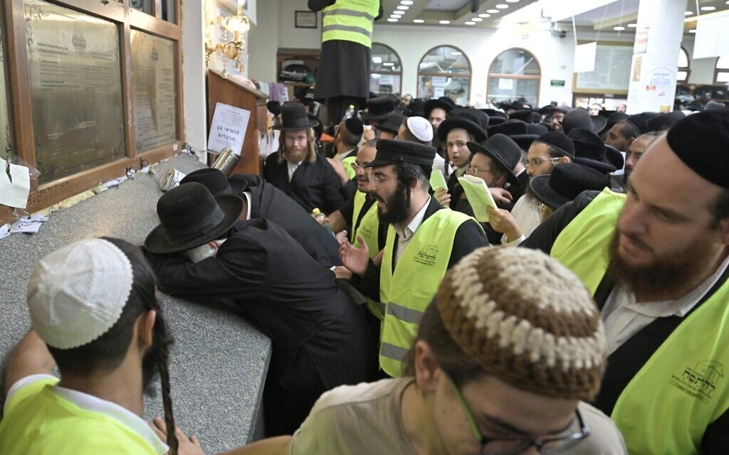 Hasidic Jewish pilgrims pray at the tomb of Rabbi Nachman ahead of the Jewish new year of Rosh Hashanah, in Uman, Ukraine, on September 15, 2023. (Genya Savilov/AFP) Hasidic Jewish pilgrims pray at the tomb of Rabbi Nachman ahead of the Jewish new year of Rosh Hashanah, in Uman, Ukraine, on September 15, 2023. (Genya Savilov/AFP)