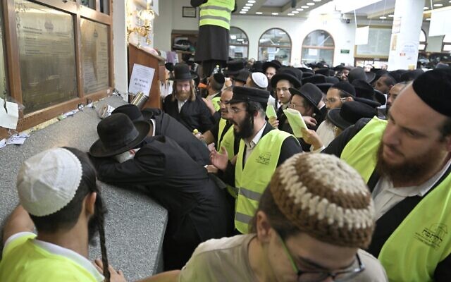 Hasidic Jewish pilgrims pray at the tomb of Rabbi Nachman ahead of the Jewish new year of Rosh Hashanah, in Uman, Ukraine, on September 15, 2023. (Genya Savilov/AFP)