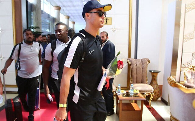 This handout picture provided by the media office of Iranian soccer club Persepolis FC on September 18, 2023 shows Saudi soccer club al-Nassr's Portuguese forward Cristiano Ronaldo (front) arriving at Tehran's Imam Khomeini International Airport, a day ahead of the AFC Champions League group E match between Persepolis FC and al-Nassr FC. (Persepolis FC / AFP) This handout picture provided by the media office of Iranian soccer club Persepolis FC on September 18, 2023 shows Saudi soccer club al-Nassr's Portuguese forward Cristiano Ronaldo (front) arriving at Tehran's Imam Khomeini International Airport, a day ahead of the AFC Champions League group E match between Persepolis FC and al-Nassr FC. (Persepolis FC / AFP)