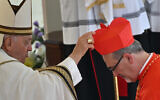 Italian Latin Patriarch of Jerusalem Pierbattista Pizzaballa (R) is elevated cardinal by Pope Francis during a consistory to create 21 new cardinals at St. Peter's square in The Vatican on September 30, 2023. (Filippo Monteforte/AFP)