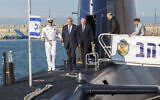 Prime Minister Benjamin Netanyahu (2nd L), then-president Reuven Rivlin (3rd L), and then-defense minister Moshe Yaalon (2nd R) attend a ceremony for the arrival of the German-made INS Rahav, the fifth Israeli Navy submarine, at the military port of Haifa on January 12, 2016. (JACK GUEZ / AFP)