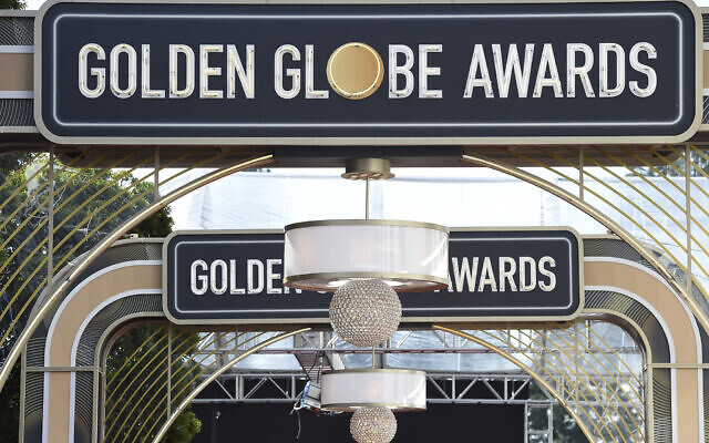 Event signage above the red carpet at the 77th annual Golden Globe Awards, in Beverly Hills, California, January 5, 2020. (Jordan Strauss/Invision/AP) Event signage above the red carpet at the 77th annual Golden Globe Awards, in Beverly Hills, California, January 5, 2020. (Jordan Strauss/Invision/AP)