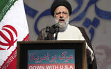 Iranian President Ebrahim Raisi addresses the crowd during an annual demonstration in front of the former US embassy in Tehran, Iran, November 4, 2022. (AP/Vahid Salemi)