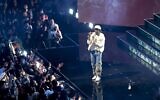 Rema performs at halftime of the NBA basketball All-Star game Feb. 19, 2023, in Salt Lake City. (AP Photo/Rob Gray)