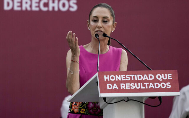 Mexico City Mayor Claudia Sheinbaum speaks to supporters during a rally before stepping down as mayor in order to run for president, in Mexico City, June 15, 2023. (AP Photo/Eduardo Verdugo)