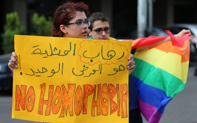 Supporters of the LGBT (Lesbian, Gay, Bisexual, and Transgender) community attend a sit-in to protest the ongoing criminalization of homosexuality and arbitrary arrests in front of Hobeich police station, in Beirut, Lebanon, Sunday, May 15, 2016. (AP/Hussein Malla) Supporters of the LGBT (Lesbian, Gay, Bisexual, and Transgender) community attend a sit-in to protest the ongoing criminalization of homosexuality and arbitrary arrests in front of Hobeich police station, in Beirut, Lebanon, Sunday, May 15, 2016. (AP/Hussein Malla)