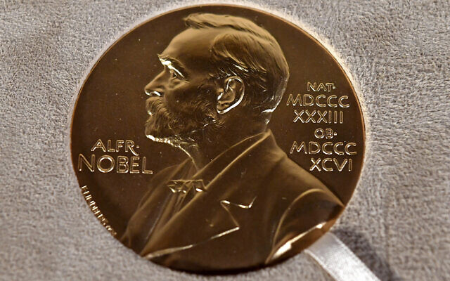 A Nobel medal displayed during a ceremony in New York, Dec. 8, 2020 (Angela Weiss/Pool Photo via AP) A Nobel medal displayed during a ceremony in New York, Dec. 8, 2020 (Angela Weiss/Pool Photo via AP)