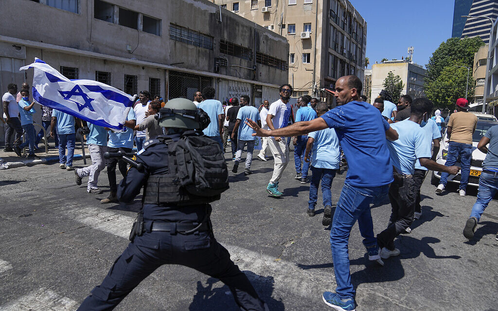 Eritrean protesters clash with Israeli riot police in Tel Aviv, Israel, Saturday, September 2, 2023. (AP/Ohad Zwigenberg) Eritrean protesters clash with Israeli riot police in Tel Aviv, Israel, Saturday, September 2, 2023. (AP/Ohad Zwigenberg)