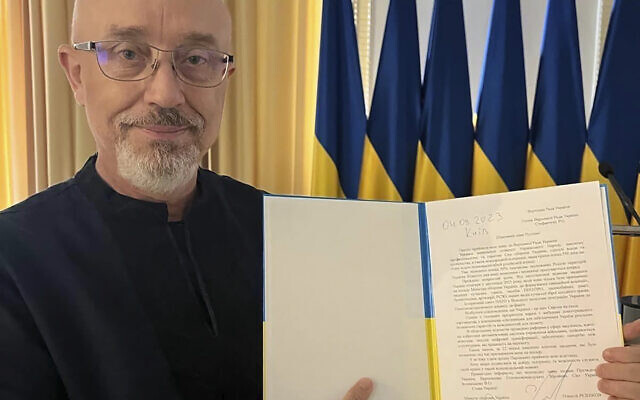 In this photo provided by the Ukrainian Parliament Press Office, Ukrainian Minister of Defense Oleksii Reznikov shows his resignation letter addressed to the Parliamentary Speaker in Kyiv, Ukraine, Monday, Sept. 4, 2023. (Ukrainian Parliament Press Office via AP) In this photo provided by the Ukrainian Parliament Press Office, Ukrainian Minister of Defense Oleksii Reznikov shows his resignation letter addressed to the Parliamentary Speaker in Kyiv, Ukraine, Monday, Sept. 4, 2023. (Ukrainian Parliament Press Office via AP)