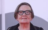 Director Agnieszka Holland poses for photographers upon arrival for the premiere of the film 'Green Border' during the 80th edition of the Venice Film Festival in Venice, Italy, on Tuesday, Sept. 5, 2023. (Vianney Le Caer/Invision/AP)