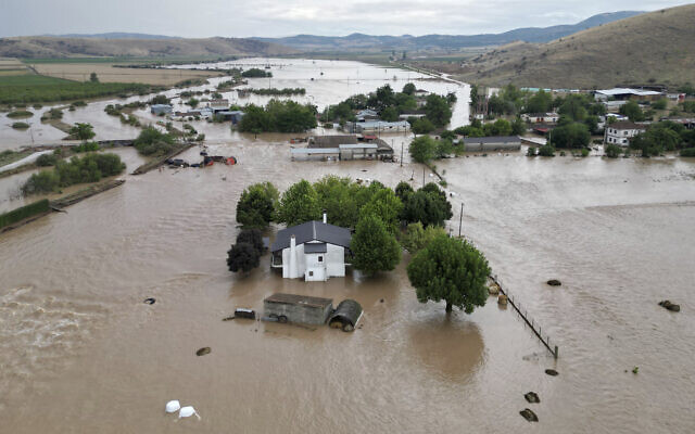 Floodwaters cover houses and farms after the country's record rainstorm in the village of Kastro, near Larissa, Thessaly region, central Greece, Thursday, Sept. 7, 2023.  (AP Photo/Vaggelis Kousioras)