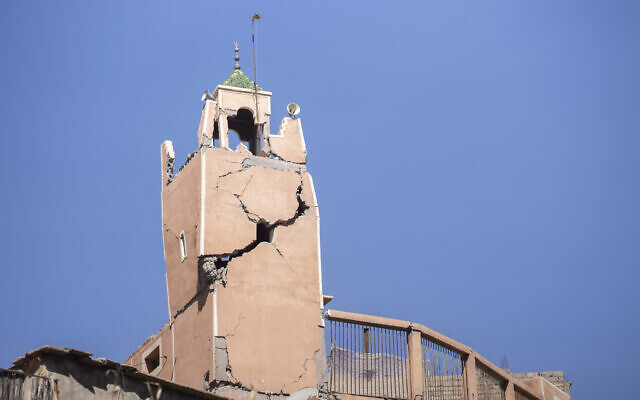 A cracked mosque minaret stands after an earthquake in Moulay Brahim village, near Marrakech, Morocco, September 9, 2023. (AP Photo/Mosa'ab Elshamy)